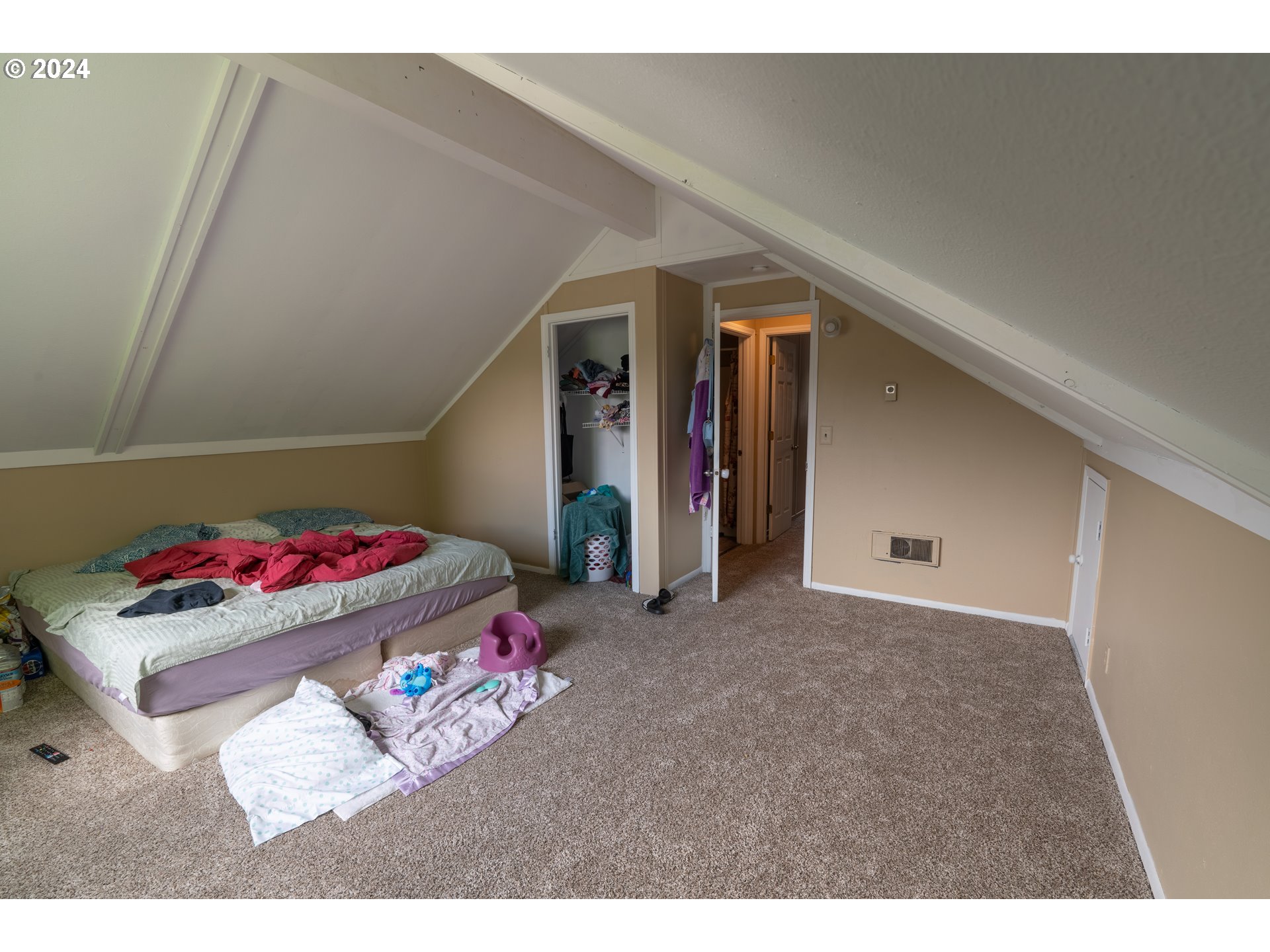 9111 Northeast 73rd Street Vancouver, WA 98662 - Photo 2 of 33 a living room with a couch and a dresser