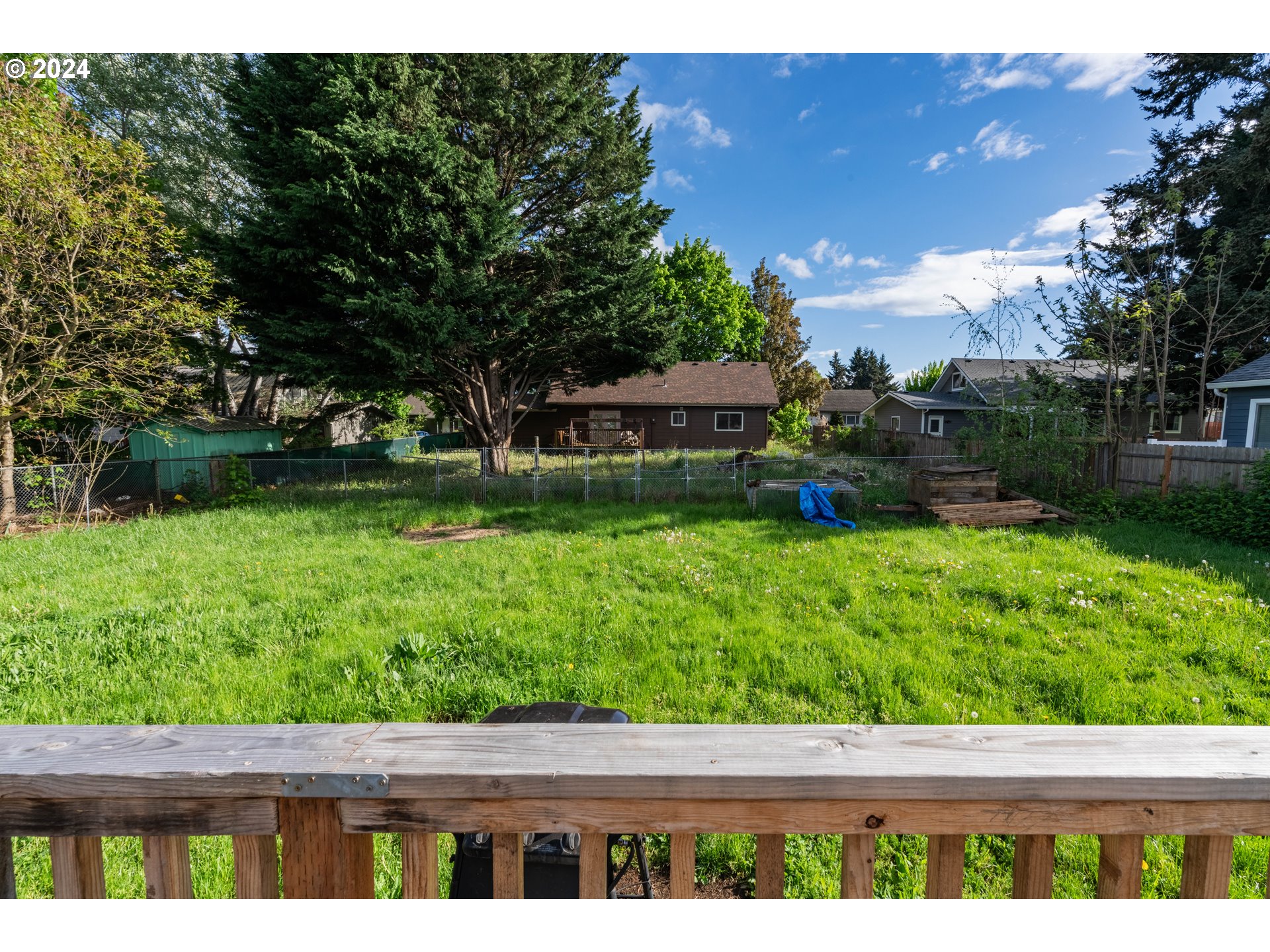9111 Northeast 73rd Street Vancouver, WA 98662 - Photo 32 of 33 a backyard of a house with lots of green space