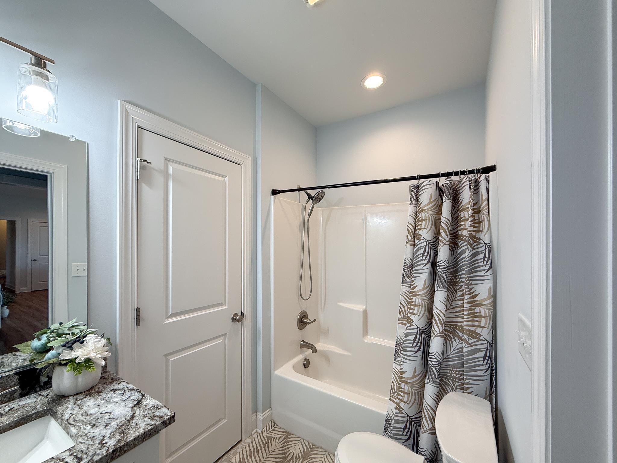 1007 Ladd Road Waynesboro, VA 22980 - Photo 18 of 33 a bathroom with a shower curtain a sink and a mirror