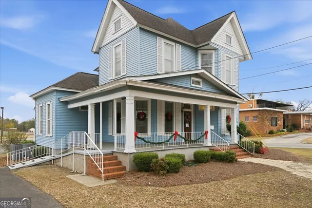 front view of a house with a patio