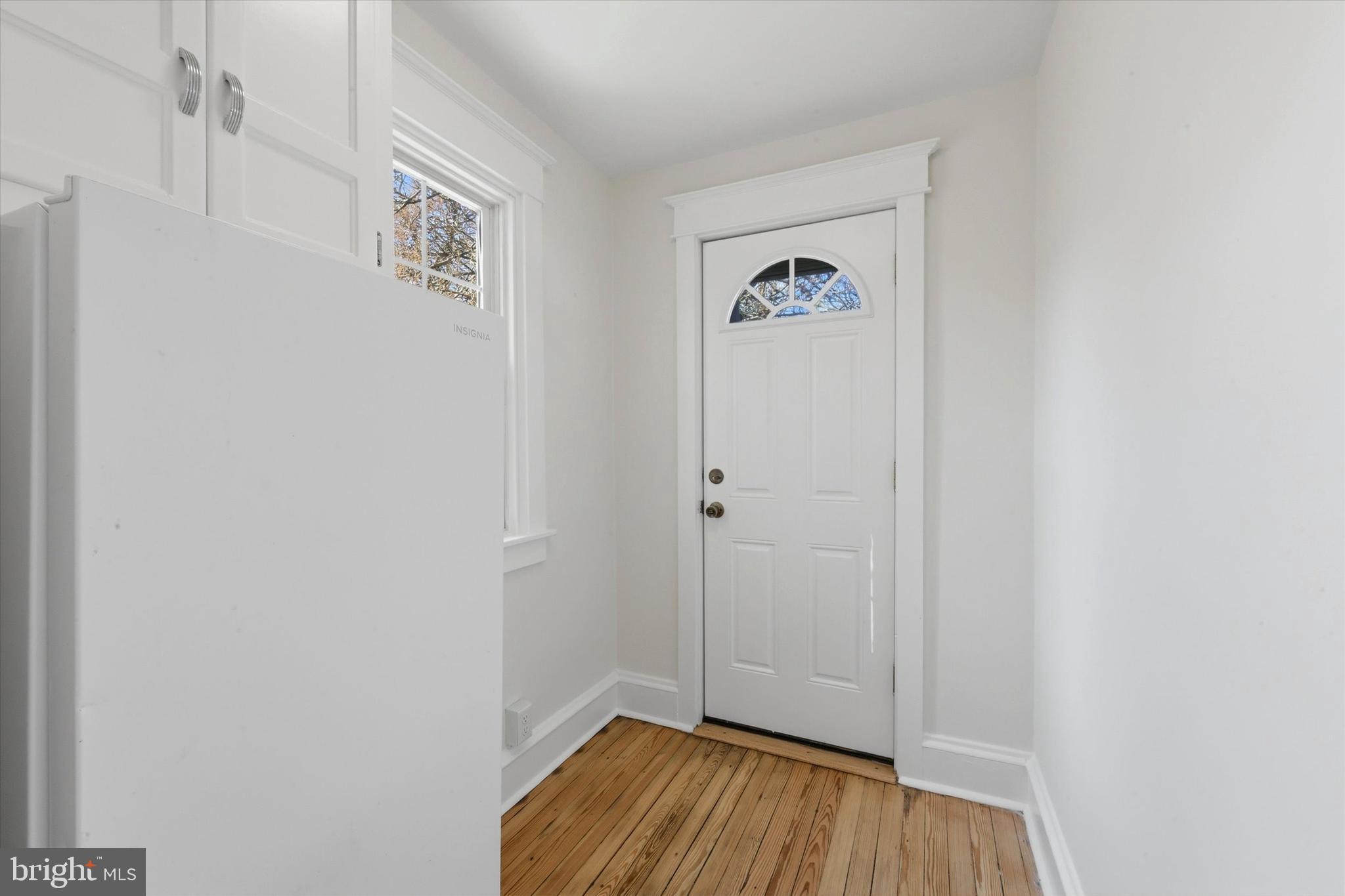 7864 Beverly Boulevard Upper Darby, PA 19082 - Photo 11 of 27 a view of a hallway with wooden floor