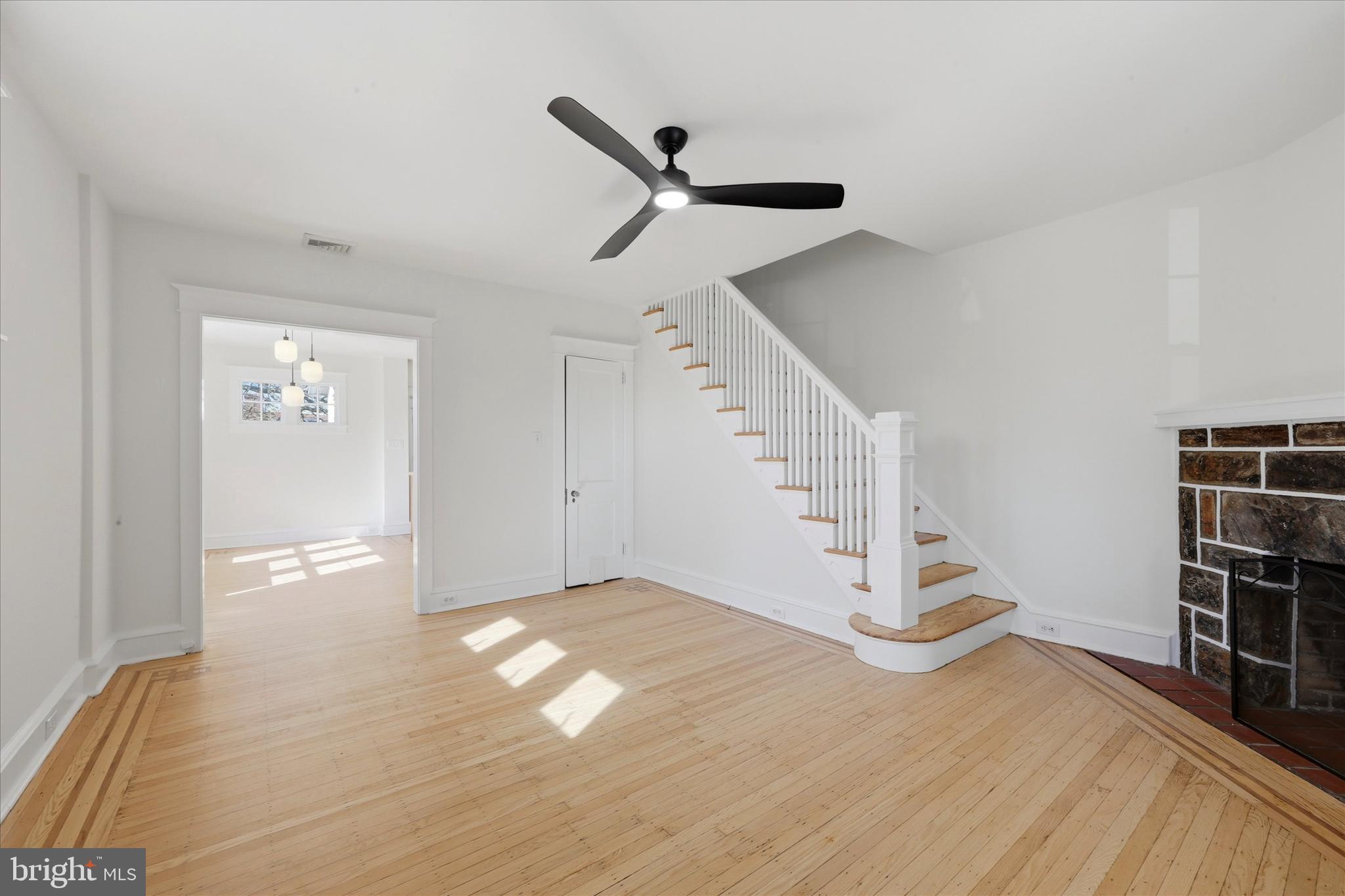 7864 Beverly Boulevard Upper Darby, PA 19082 - Photo 3 of 27 a view of empty room with wooden floor and fan