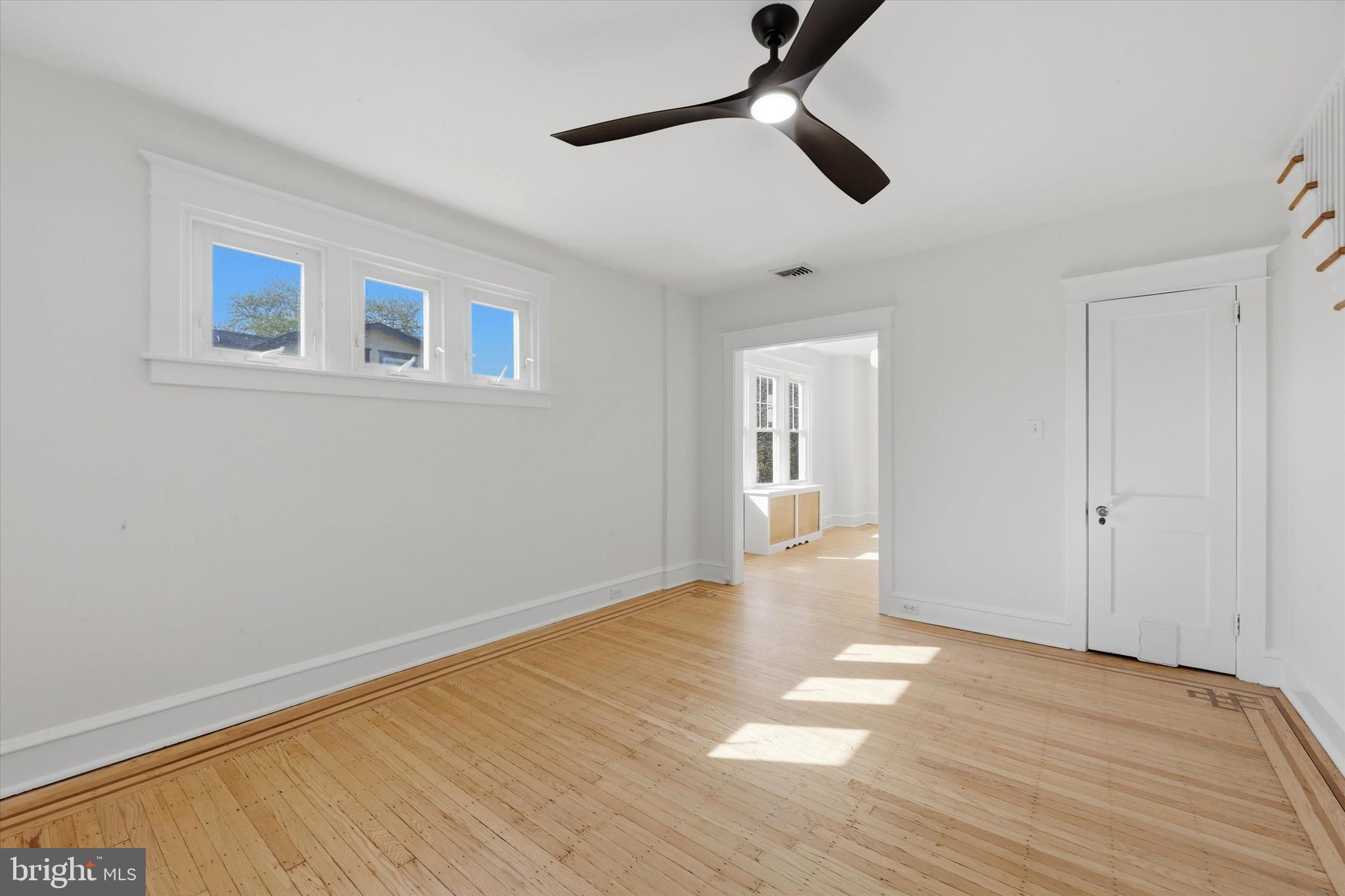 7864 Beverly Boulevard Upper Darby, PA 19082 - Photo 4 of 27 a view of an empty room with wooden floor