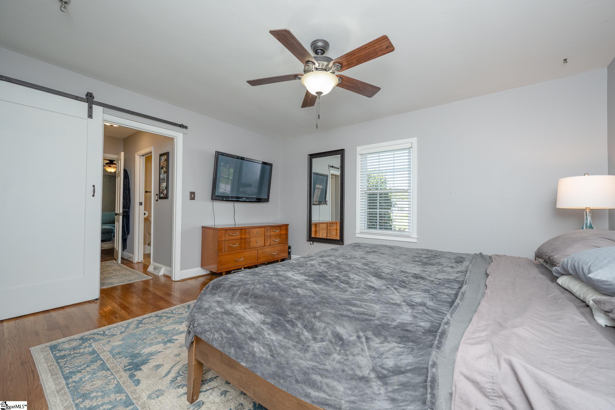 1138 Miller Road Greenville, SC 29607 - Photo 11 of 32 Beautiful wood floors and barnyard door.