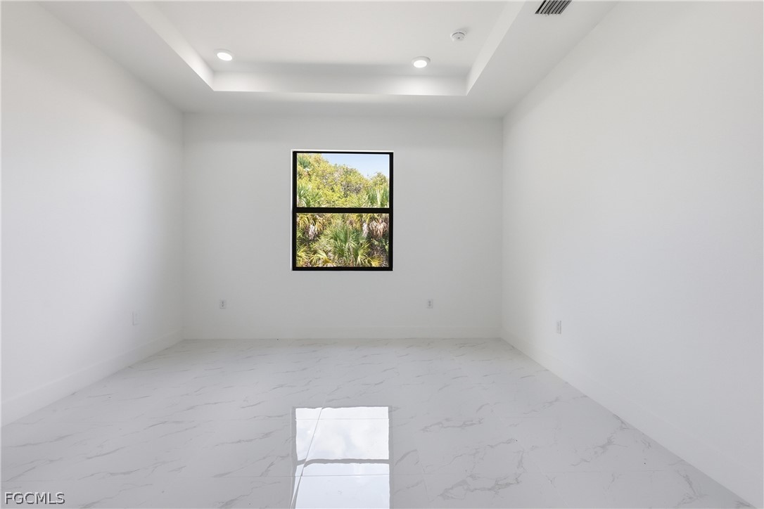 1253 Argosy Road LaBelle, FL 33935 - Photo 12 of 35 an empty room with a window