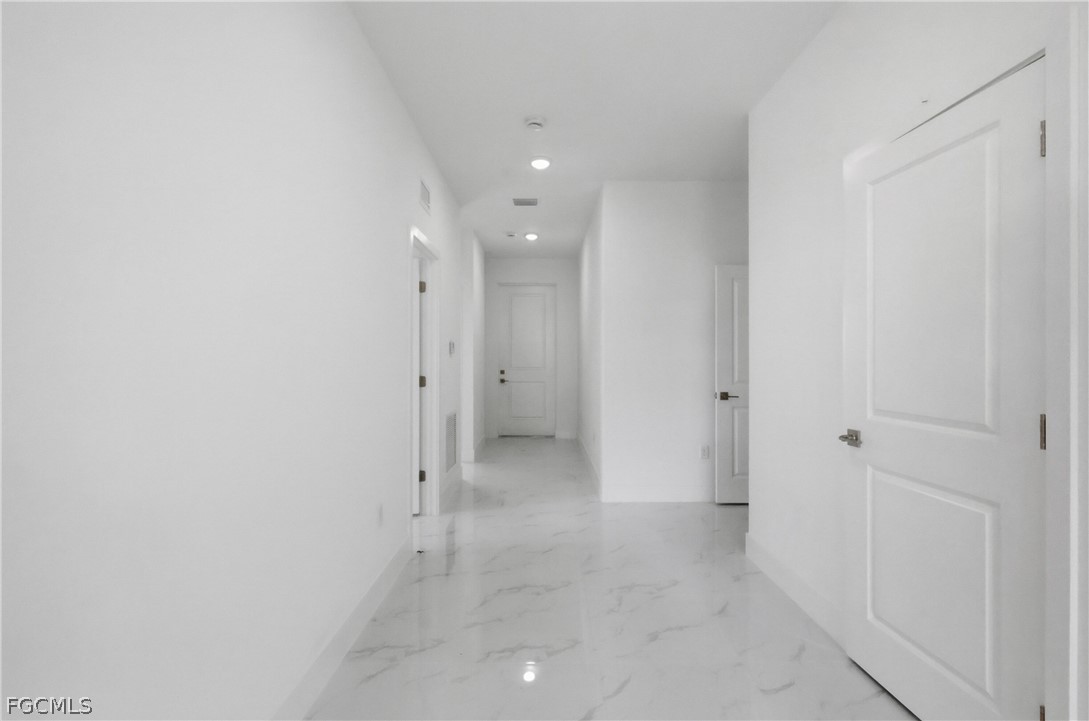 1253 Argosy Road LaBelle, FL 33935 - Photo 29 of 35 a view of a hallway