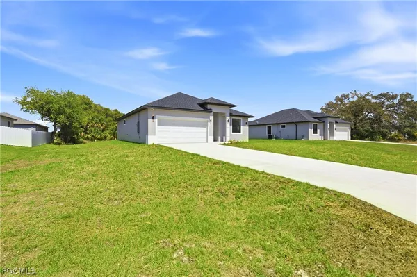 a front view of house with yard