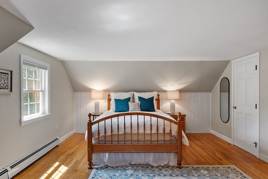 27 Mill Lane Littleton, MA 01460 - Photo 22 of 38 a bed room with a bed and a window