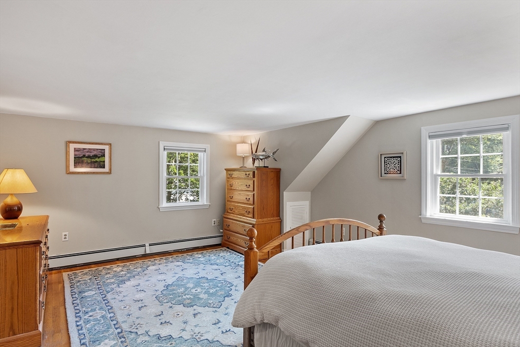 27 Mill Lane Littleton, MA 01460 - Photo 23 of 38 a bed room with a bed and a window