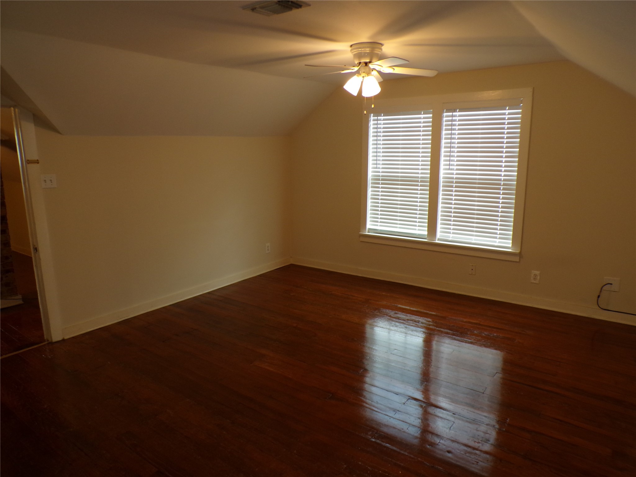 3416 Morrison Street, Unit 9 Houston, TX 77009 - Photo 9 of 38 Living Room. Nice size. Has ceiling fan and recently installed window blinds.