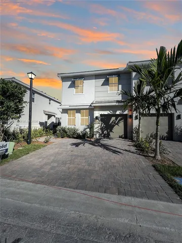 a view of a house with a street