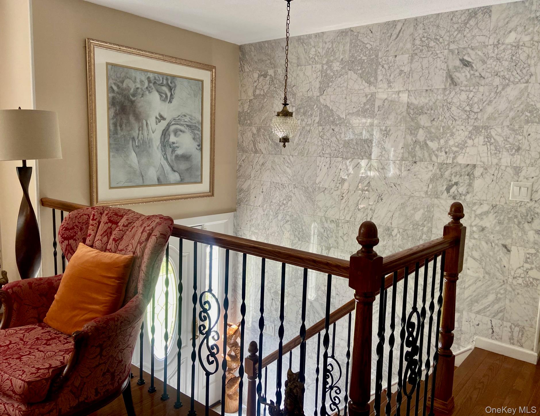 253 Ackertown Road Monsey, NY 10952 - Photo 3 of 38 Staircase featuring wood finished floors and tile walls
