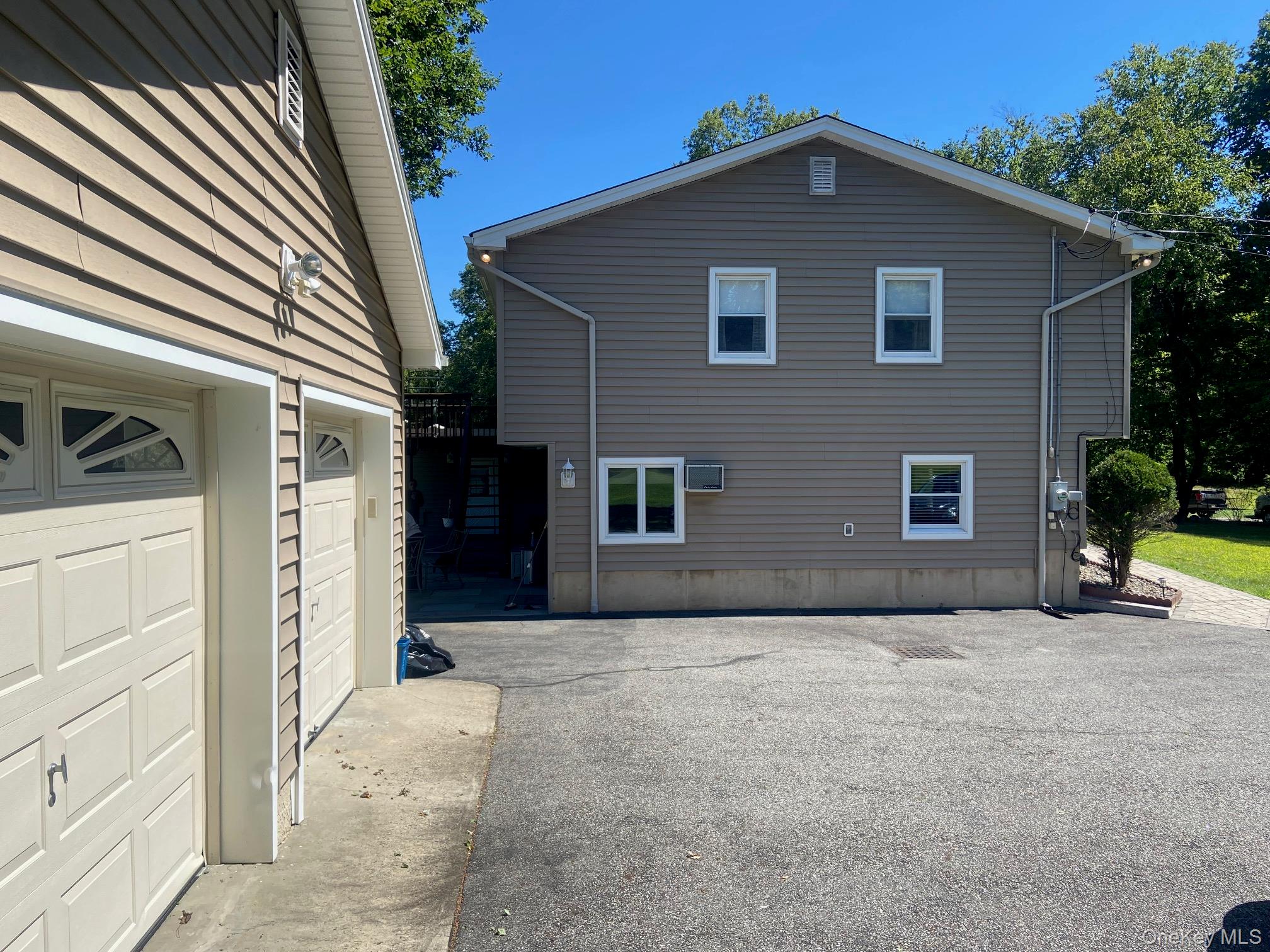253 Ackertown Road Monsey, NY 10952 - Photo 37 of 38 View of home's exterior with driveway and garage