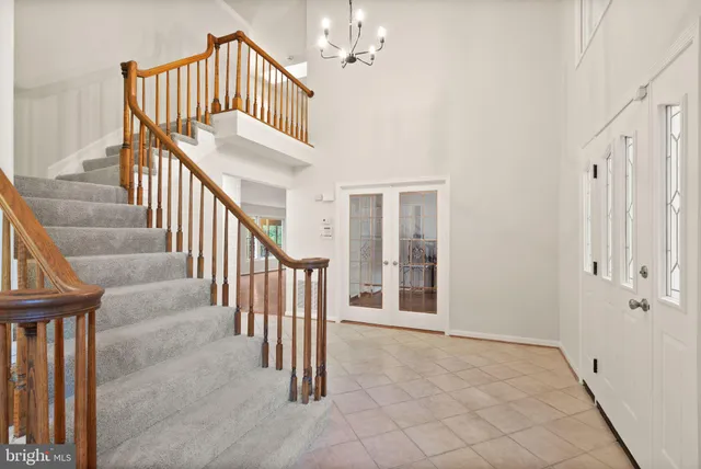 a bathroom with a toilet and a window