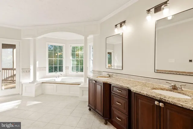 an aerial view of house with yard