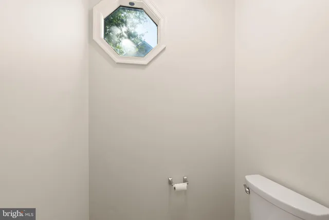 an aerial view of residential house with outdoor space and swimming pool