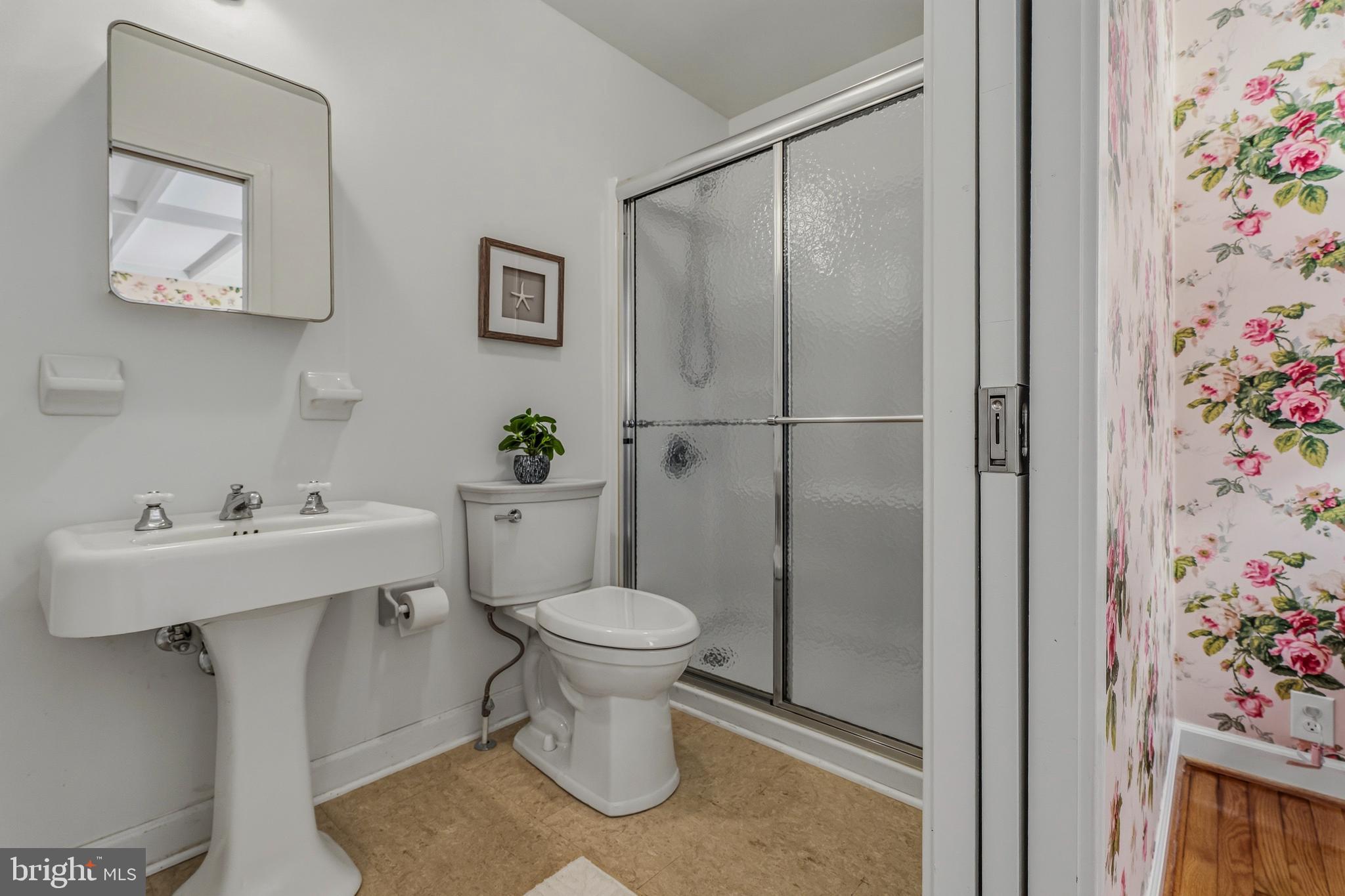 2425 Albert Rill Road Hampstead, MD 21074 - Photo 26 of 44 a bathroom with a sink toilet and shower