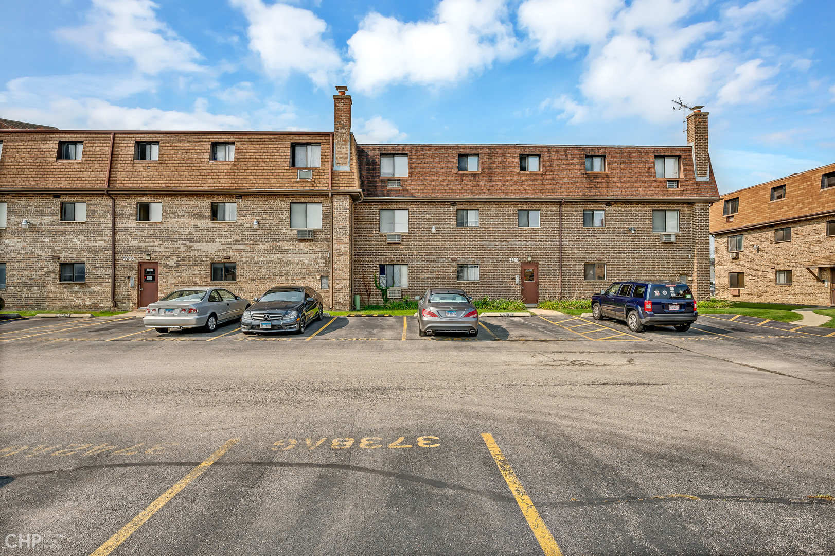 3750 Salem Walk, Unit B2 Northbrook, IL 60062 - Photo 15 of 15 a car parked in front of a building
