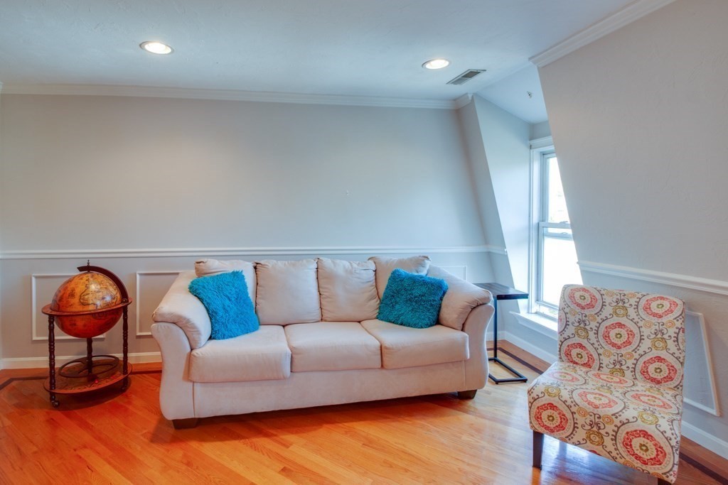 10 Maple Avenue, Unit 3 Andover, MA 01810 - Photo 3 of 11 a living room with furniture and a window