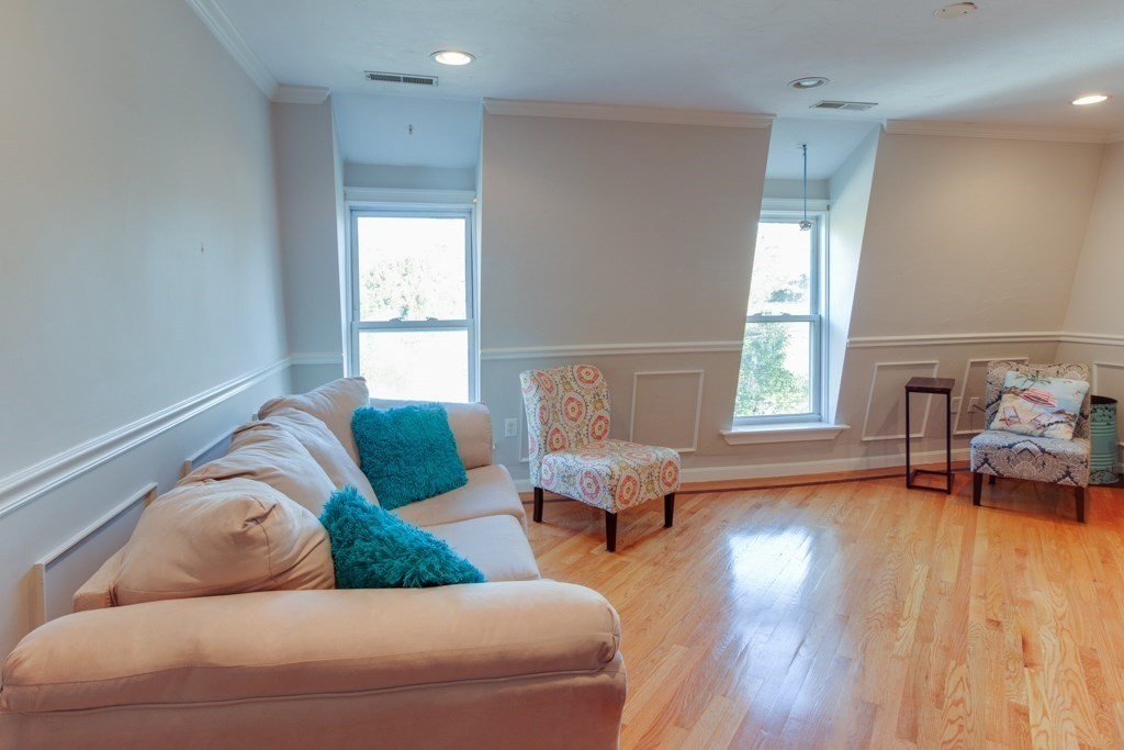 10 Maple Avenue, Unit 3 Andover, MA 01810 - Photo 4 of 11 a living room with furniture and a window