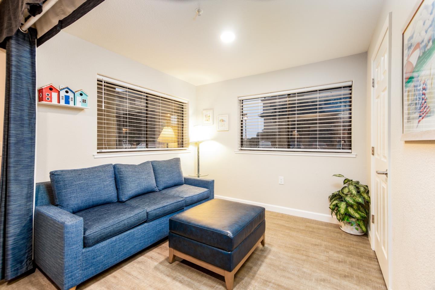 449 Seascape Resort Drive Aptos, CA 95003 - Photo 4 of 14 a living room with furniture and a window
