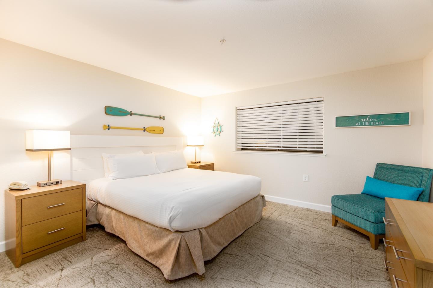 449 Seascape Resort Drive Aptos, CA 95003 - Photo 5 of 14 a bedroom with a bed and a couch