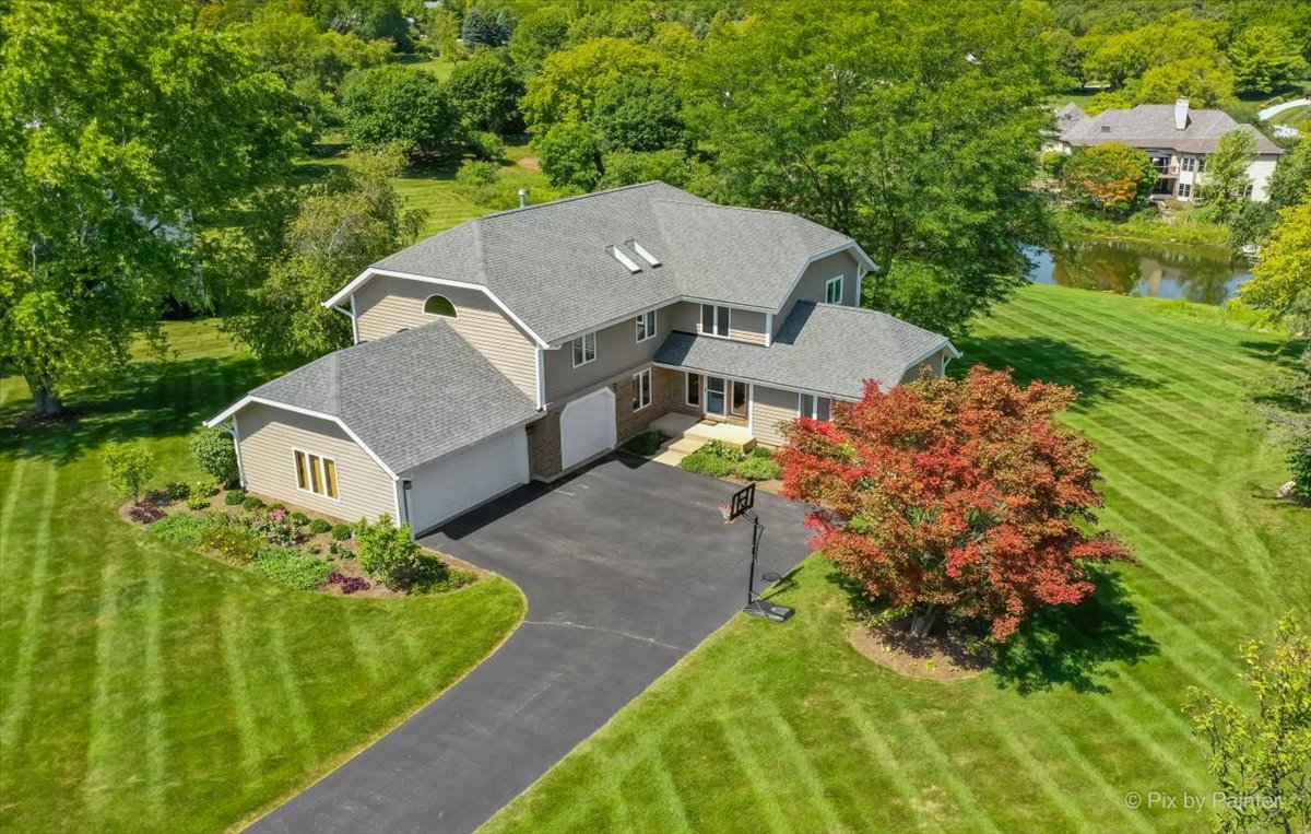 35W723 Parsons Road Algonquin, IL 60102 - Photo 1 of 52 an aerial view of a house
