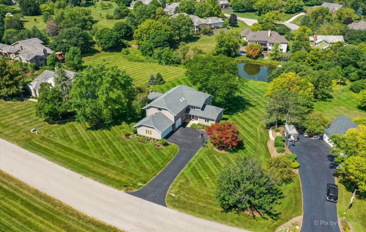 35W723 Parsons Road Algonquin, IL 60102 - Photo 46 of 52 an aerial view of a garden with swimming pool