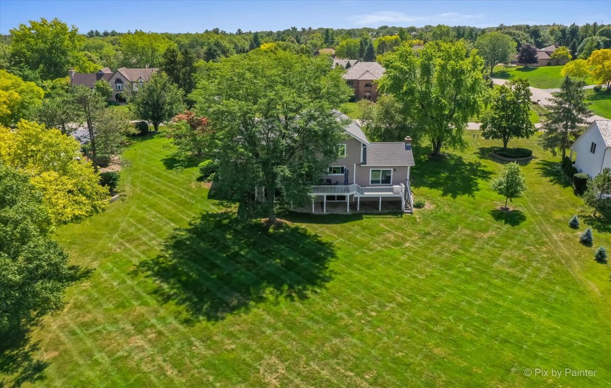 35W723 Parsons Road Algonquin, IL 60102 - Photo 48 of 52 an aerial view of a house with a yard