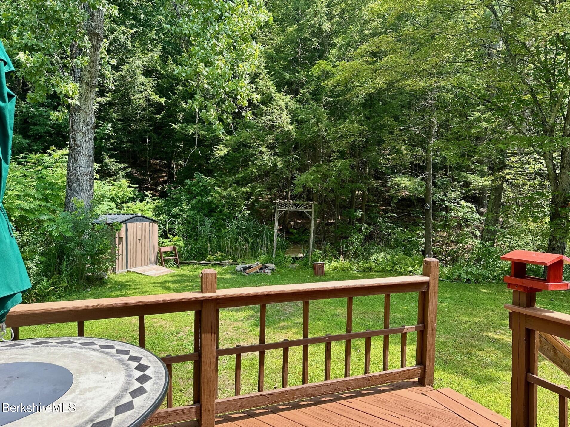 1872 North Main Road Otis, MA 01253 - Photo 22 of 33 a view of a two chairs in the deck