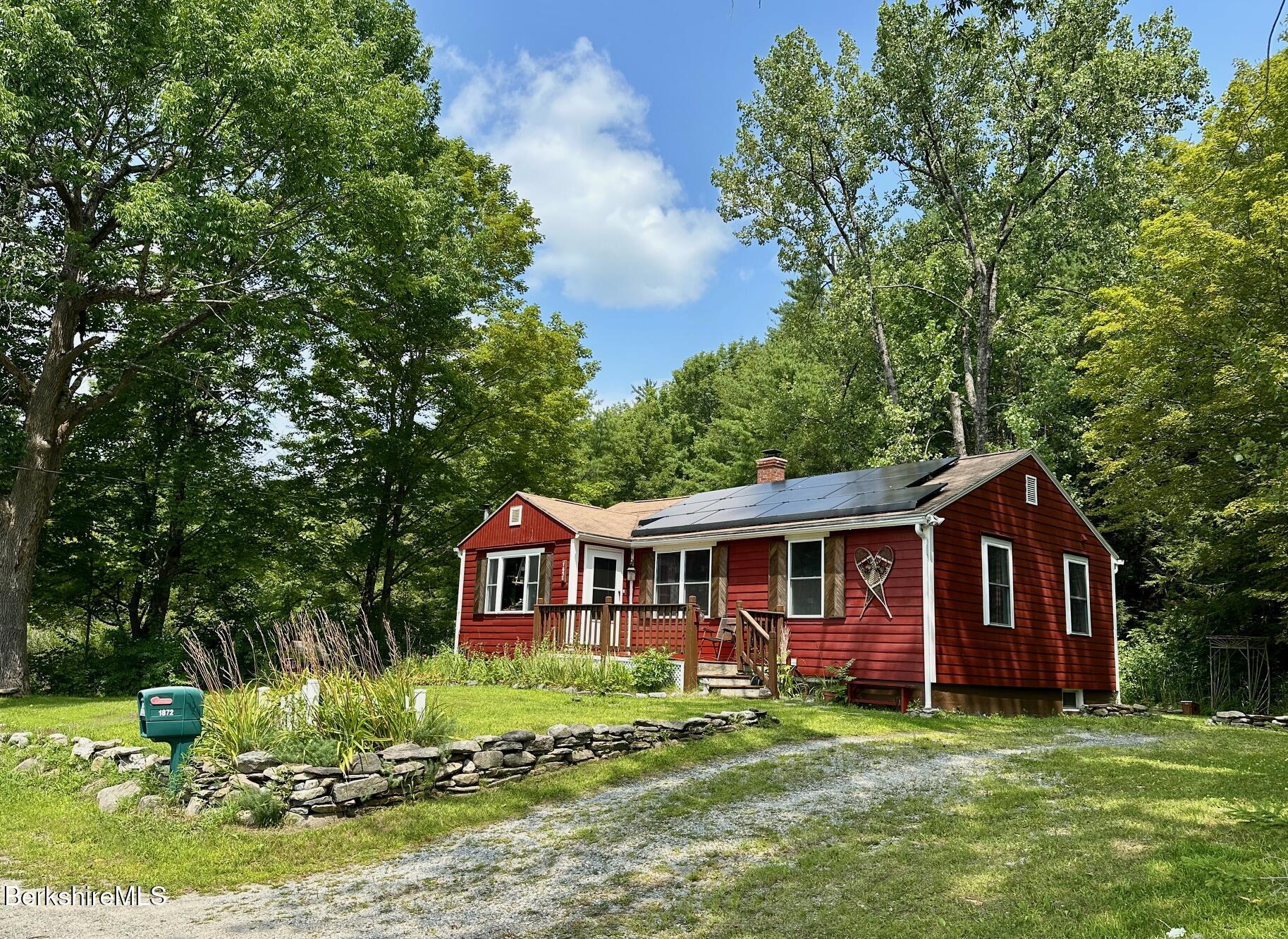 1872 North Main Road Otis, MA 01253 - Photo 29 of 33 a front view of a house with garden