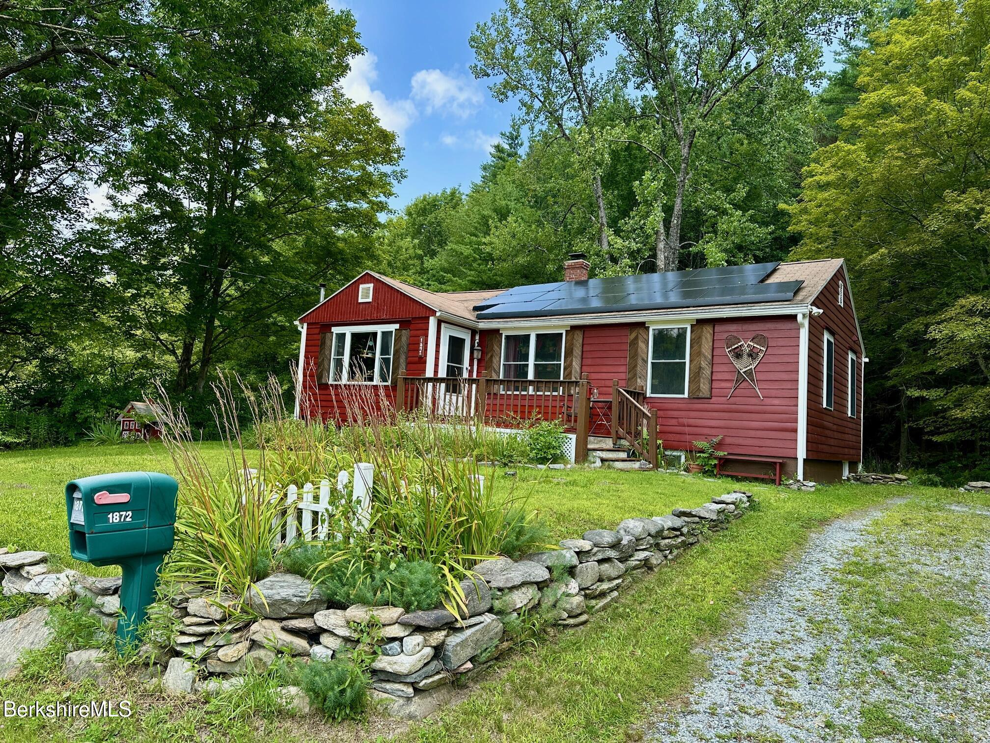 1872 North Main Road Otis, MA 01253 - Photo 31 of 33 a front view of a house with garden