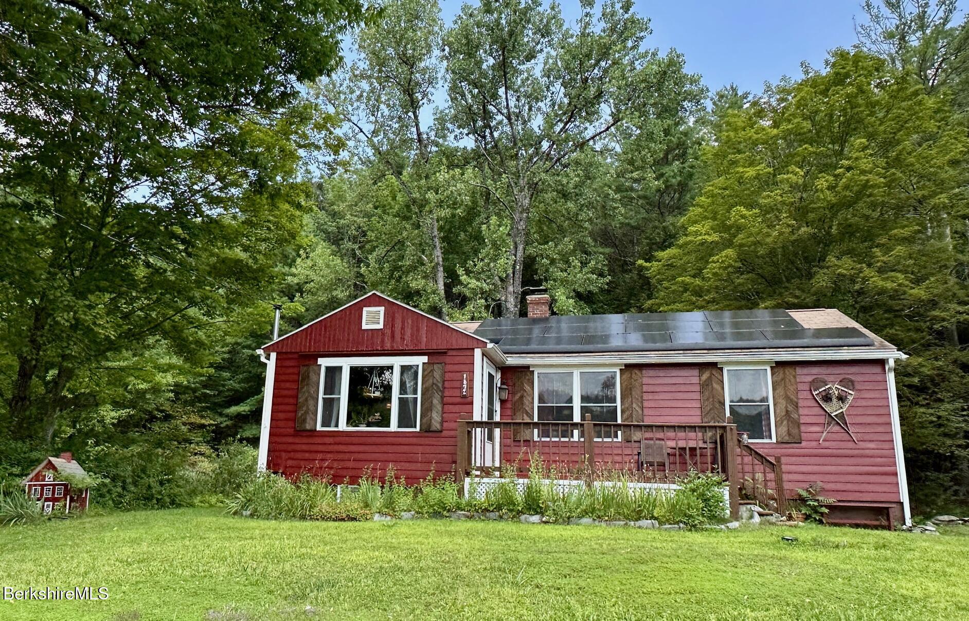 1872 North Main Road Otis, MA 01253 - Photo 33 of 33 a front view of a house with garden
