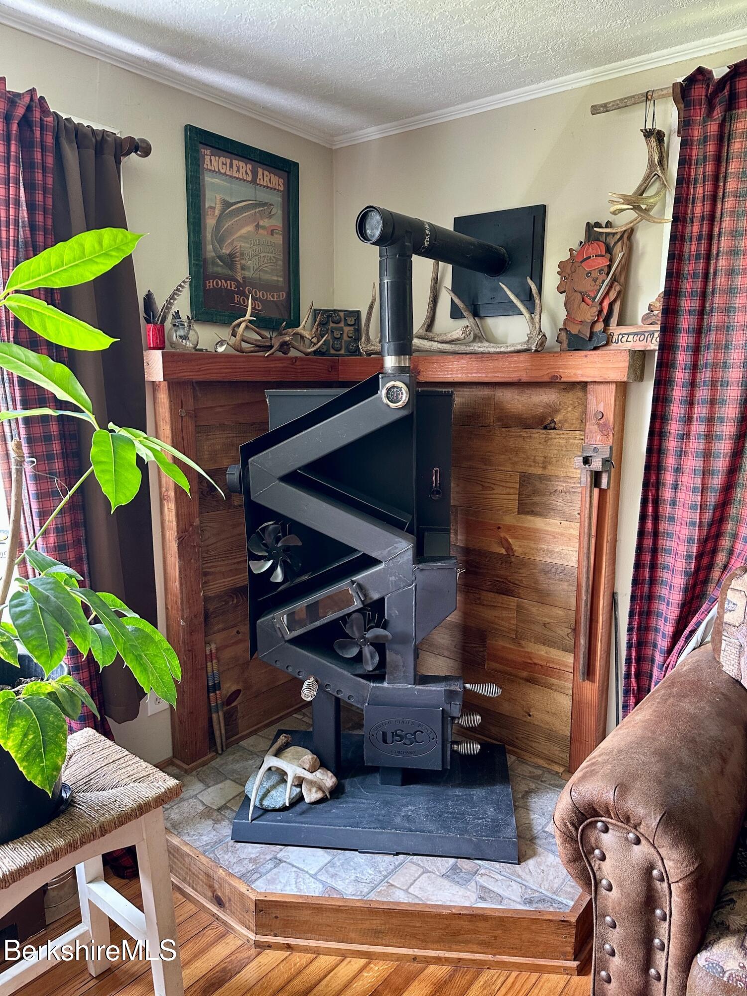 1872 North Main Road Otis, MA 01253 - Photo 4 of 33 a living room with furniture and a potted plant