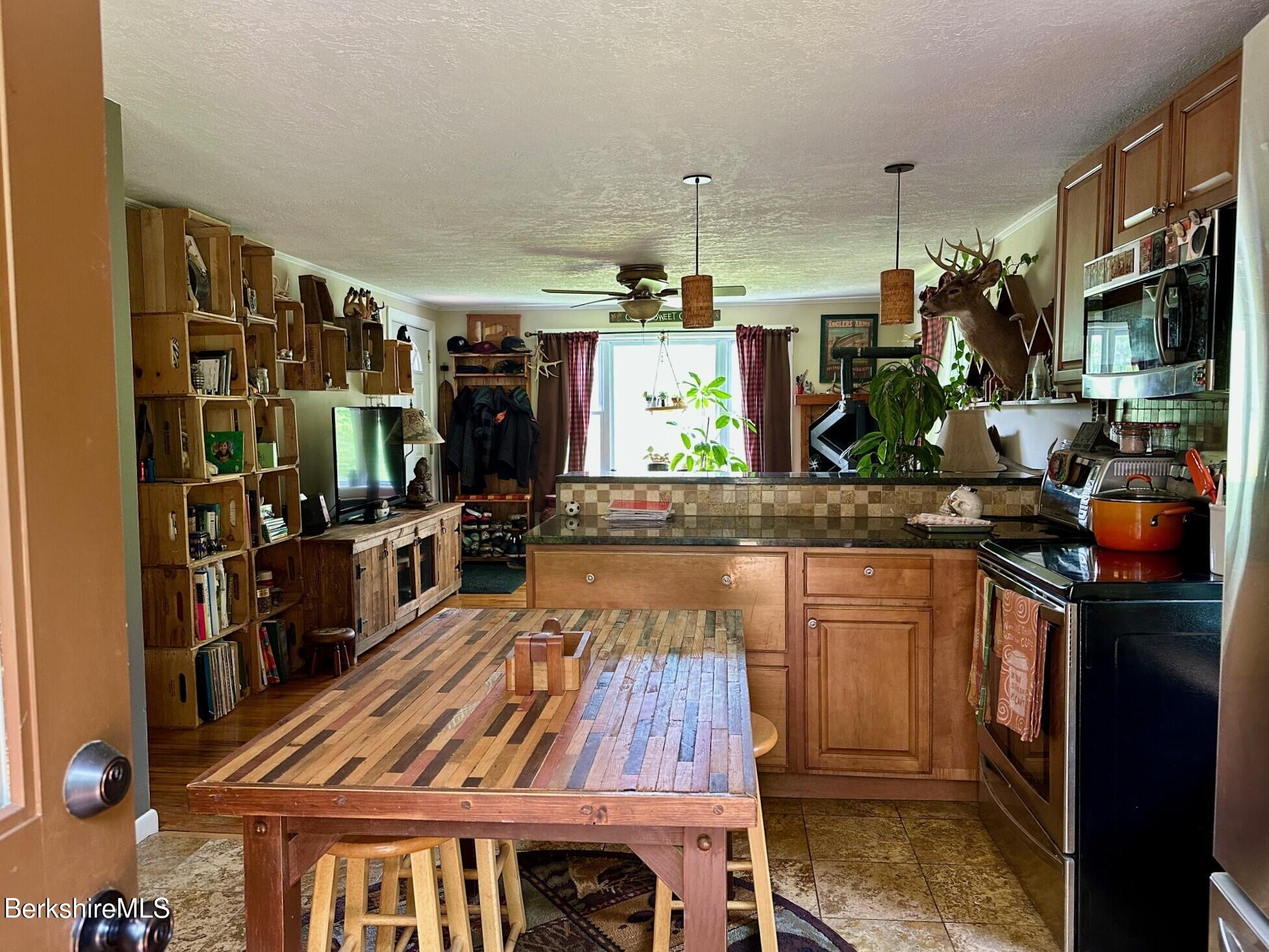 1872 North Main Road Otis, MA 01253 - Photo 10 of 33 a very nice looking room with a large window and sitting space