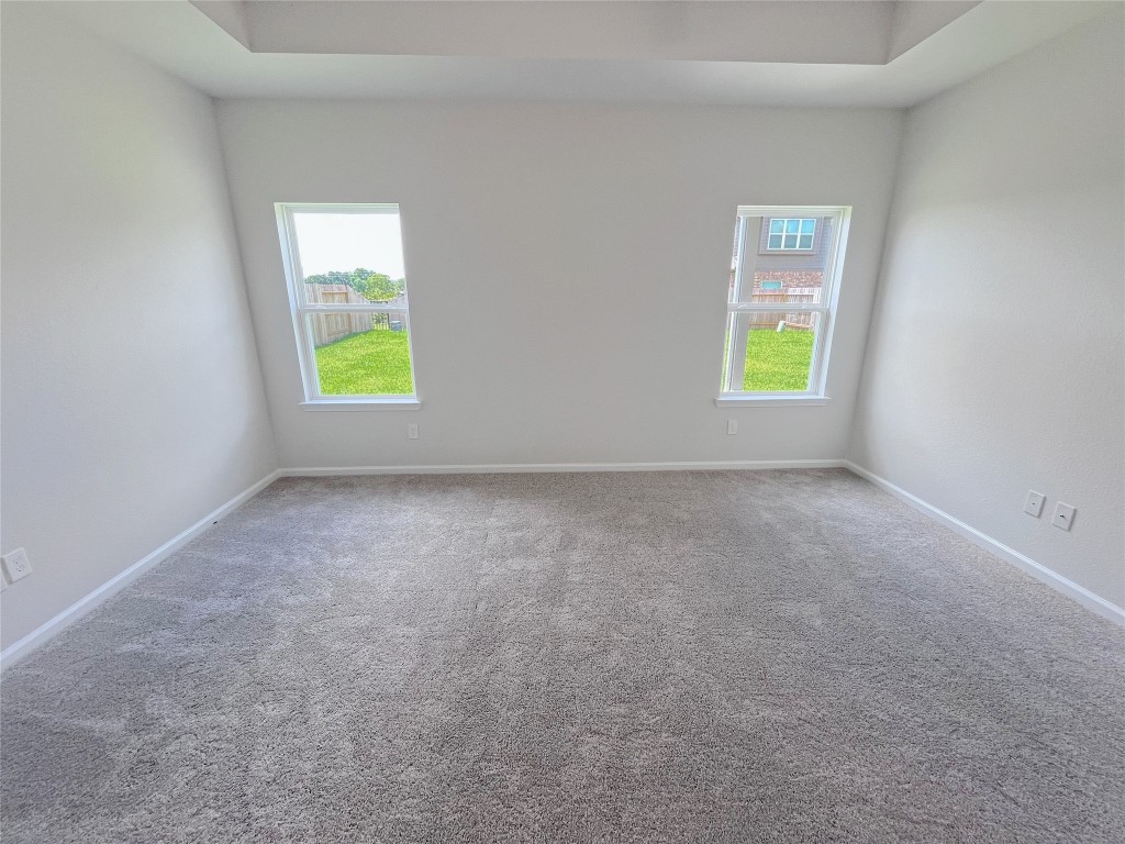 9710 Enclave Ridge Road Willis, TX 77318 - Photo 12 of 24 The Georgetown II- Primary Suite. Sample image for illustration; upgrades, options, and colors may vary.