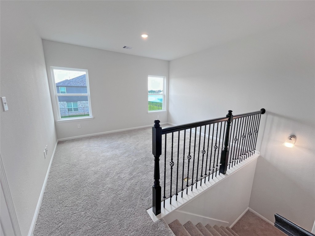 9710 Enclave Ridge Road Willis, TX 77318 - Photo 16 of 24 The Georgetown II- Bonus Room/Game Room. Sample image for illustration; upgrades, options, and colors may vary.