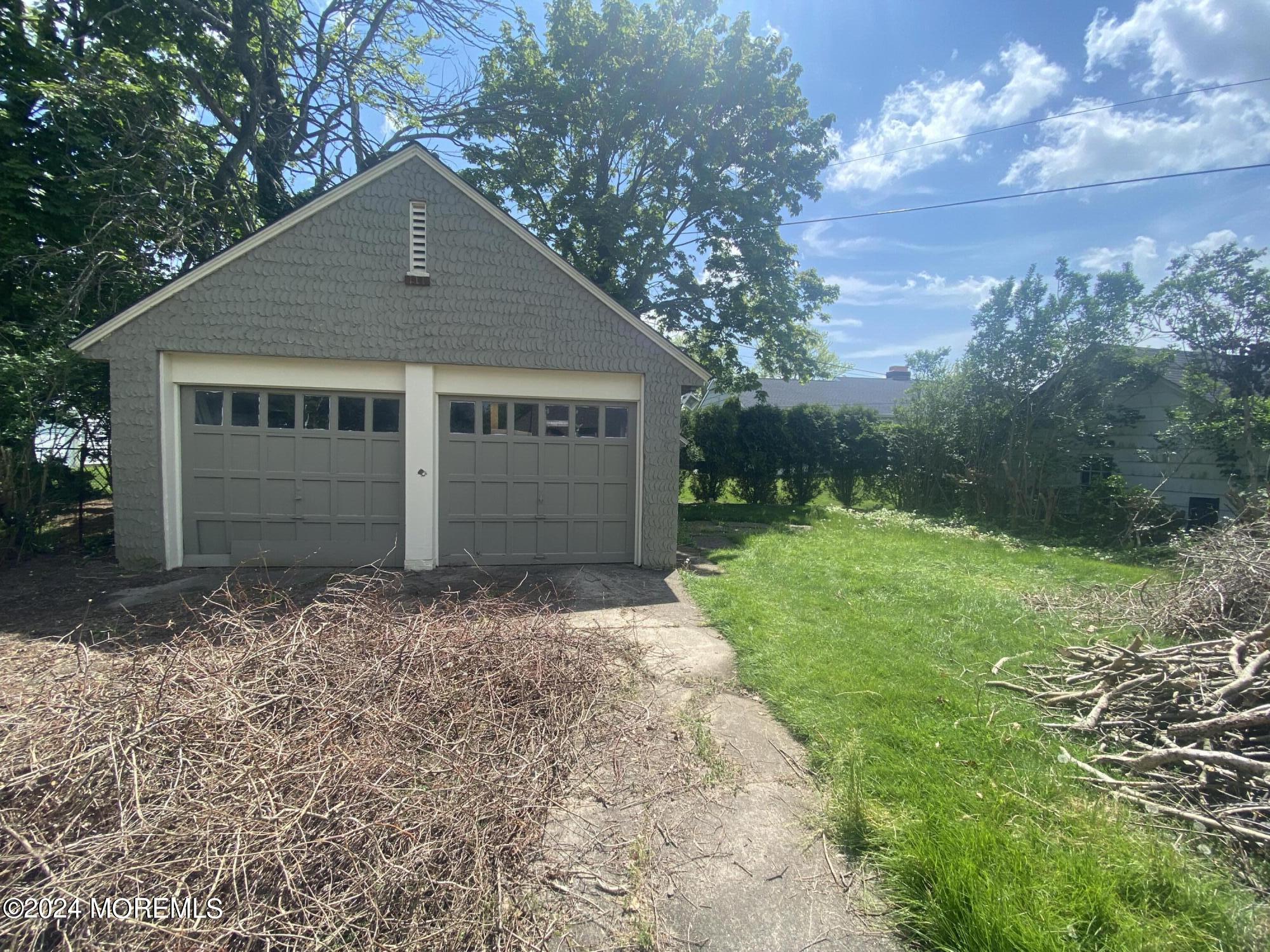 98 Darlington Road Deal, NJ 07723 - Photo 16 of 18 Backyard 2 car garage