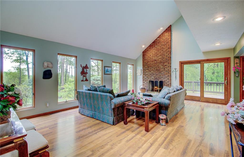381 Branchton Road Slippery Rock, PA 16057 - Photo 4 of 25 Beautiful gunstock tone flooring and large windows make this spacious yet cozy living room light and bright, a comfortable place to relax 21x15