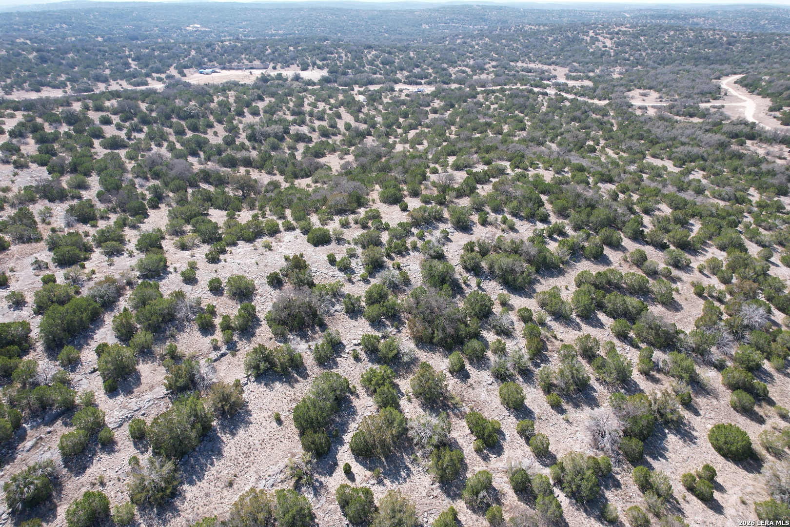 2197 Sd 45340 Rocksprings, TX 78880 - Photo 9 of 37 an aerial view of residential houses with city view