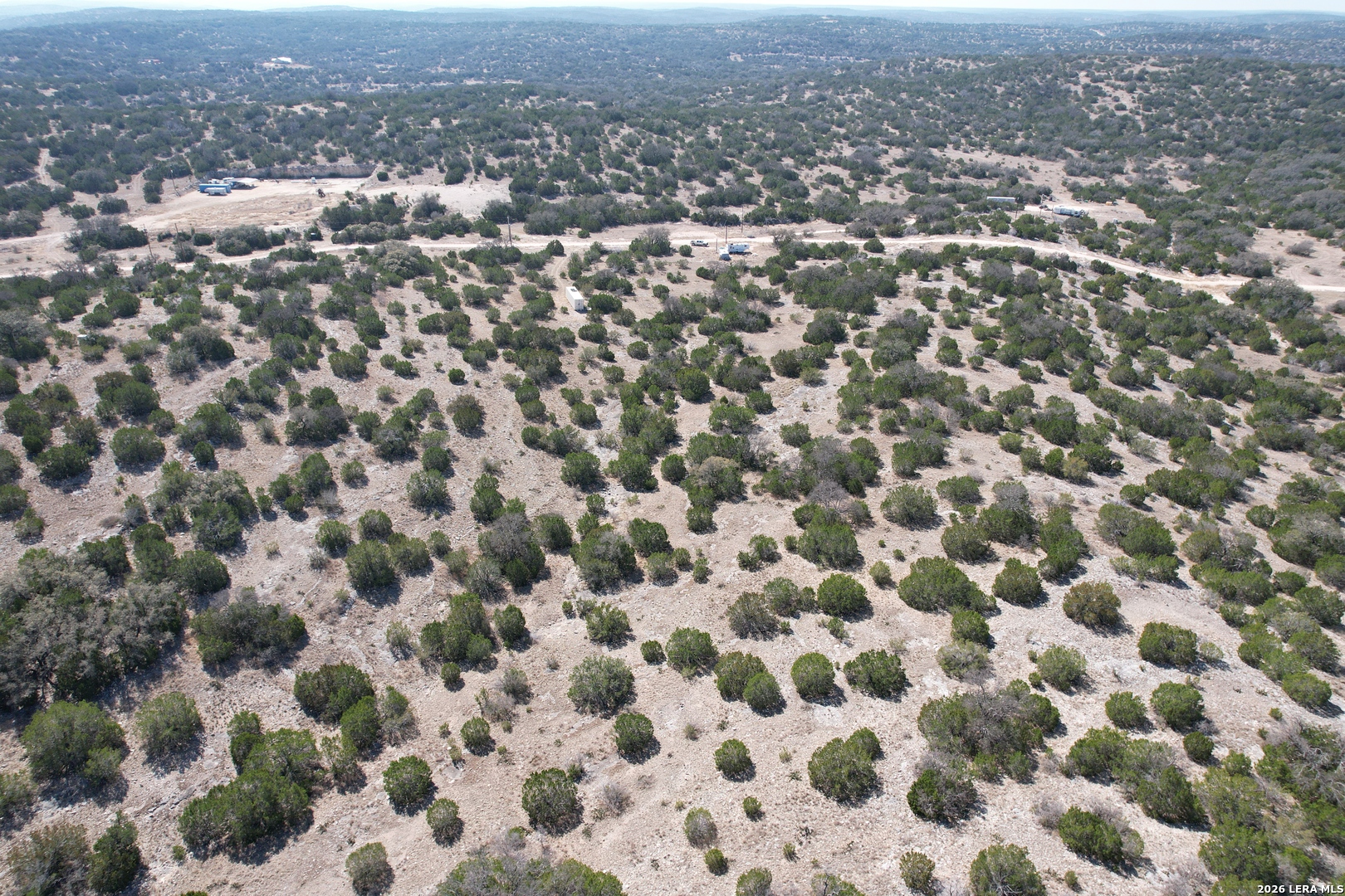 2197 Sd 45340 Rocksprings, TX 78880 - Photo 10 of 37 an aerial view of residential houses with city view