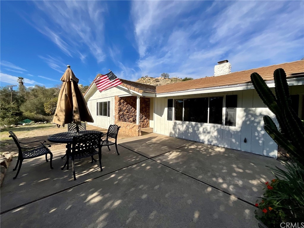 2460 Helen Road Fallbrook, CA 92028 - Photo 1 of 1 a patio with sofas table and chairs