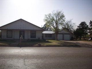 1401 Main Ralls, TX 79357 - Photo 1 of 1 a house view with a outdoor space