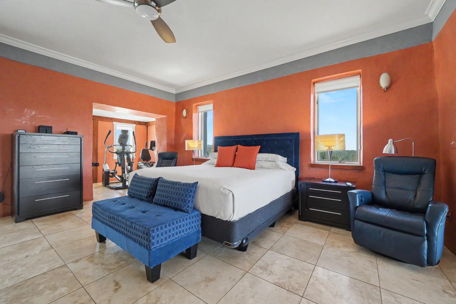 15070 Willow Creek Road Ione, CA 95640 - Photo 46 of 66 a bedroom with a bed and chair