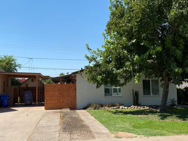 a front view of house with yard