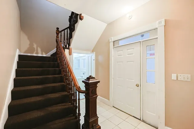 a view of entryway with a front door