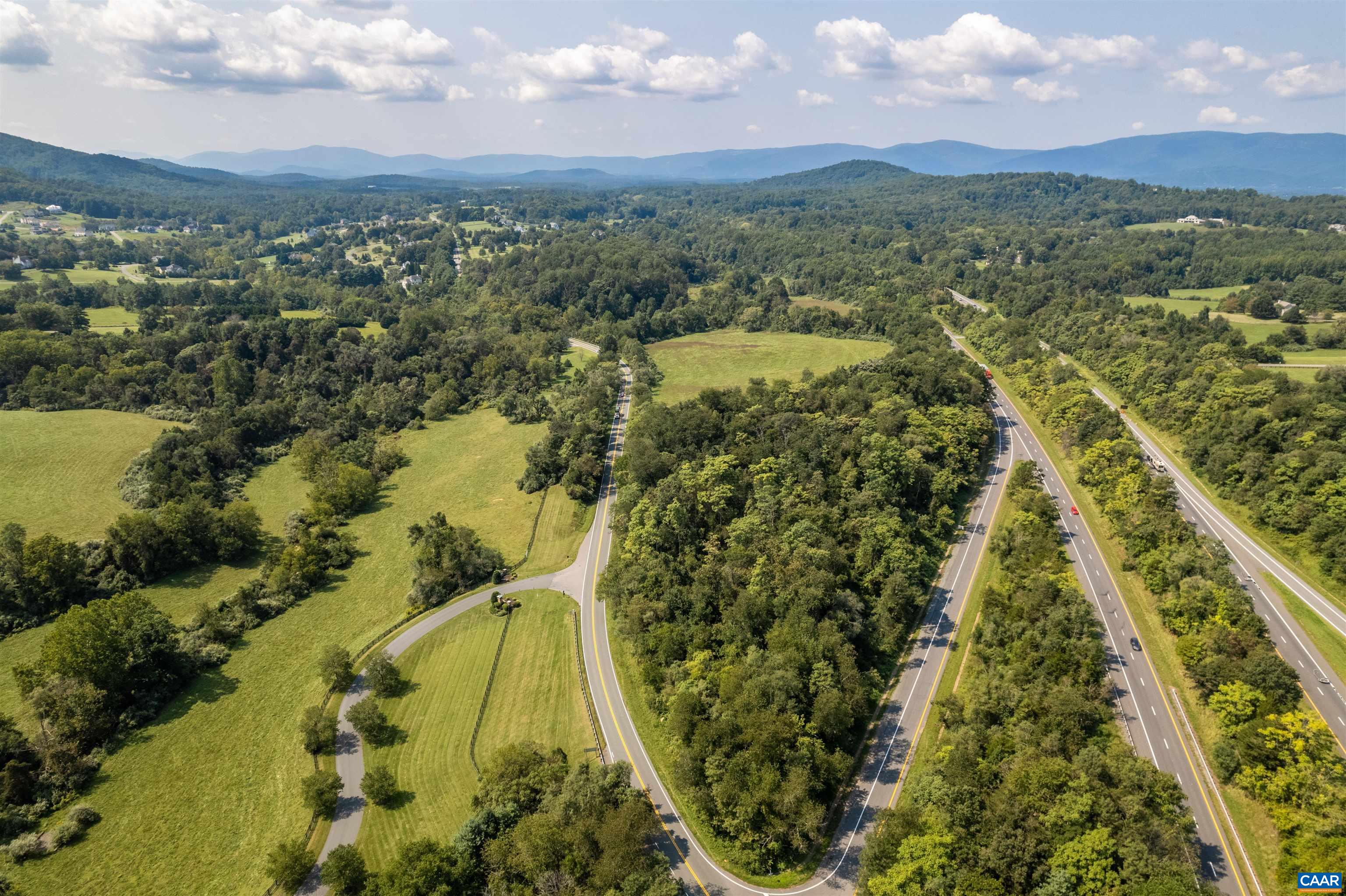 B1 Dick Woods Road Charlottesville, VA 22903 - Photo 1 of 11 an aerial view of residential houses with outdoor space