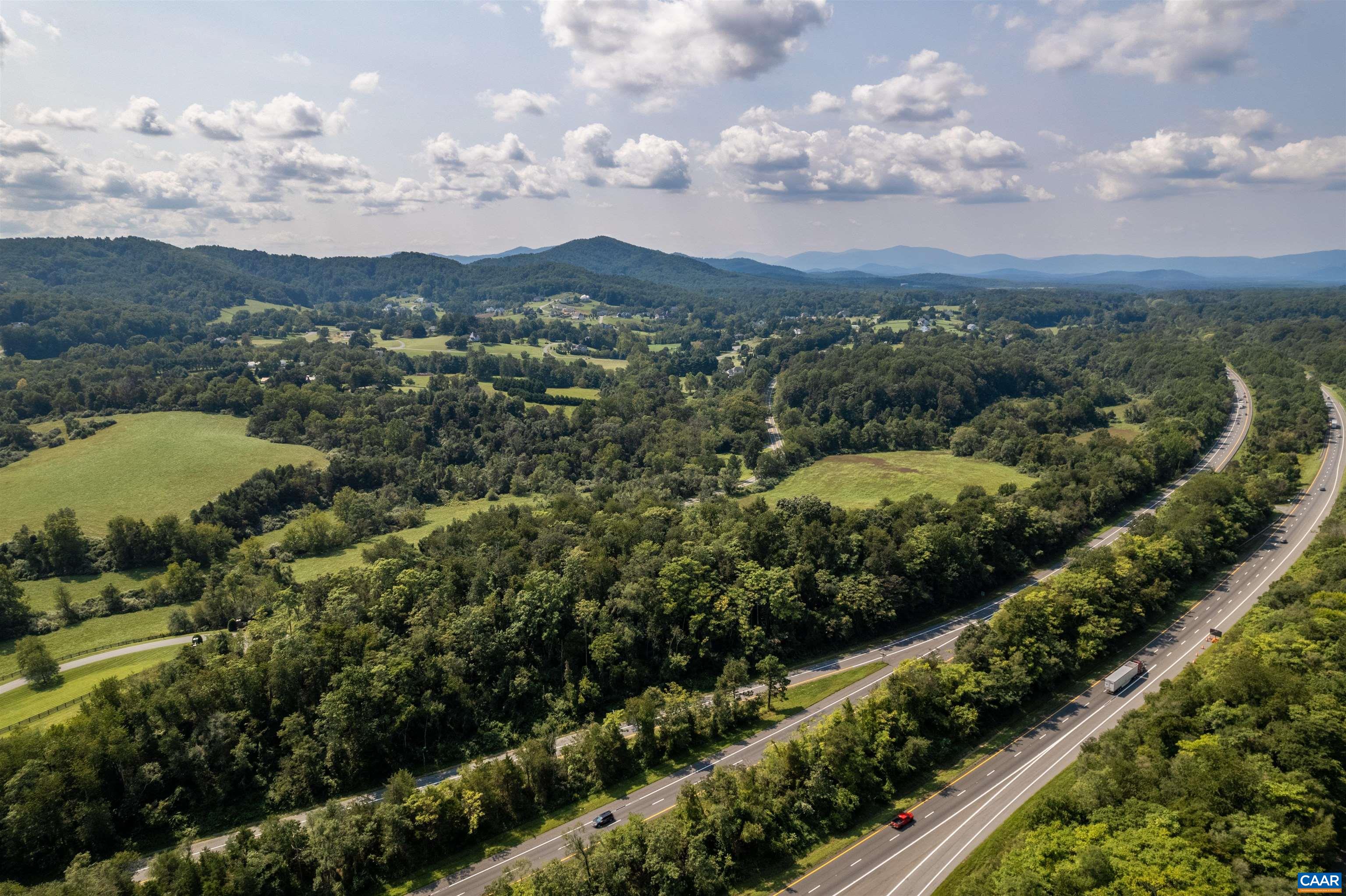 B1 Dick Woods Road Charlottesville, VA 22903 - Photo 6 of 11 a view of a city with mountains in the background
