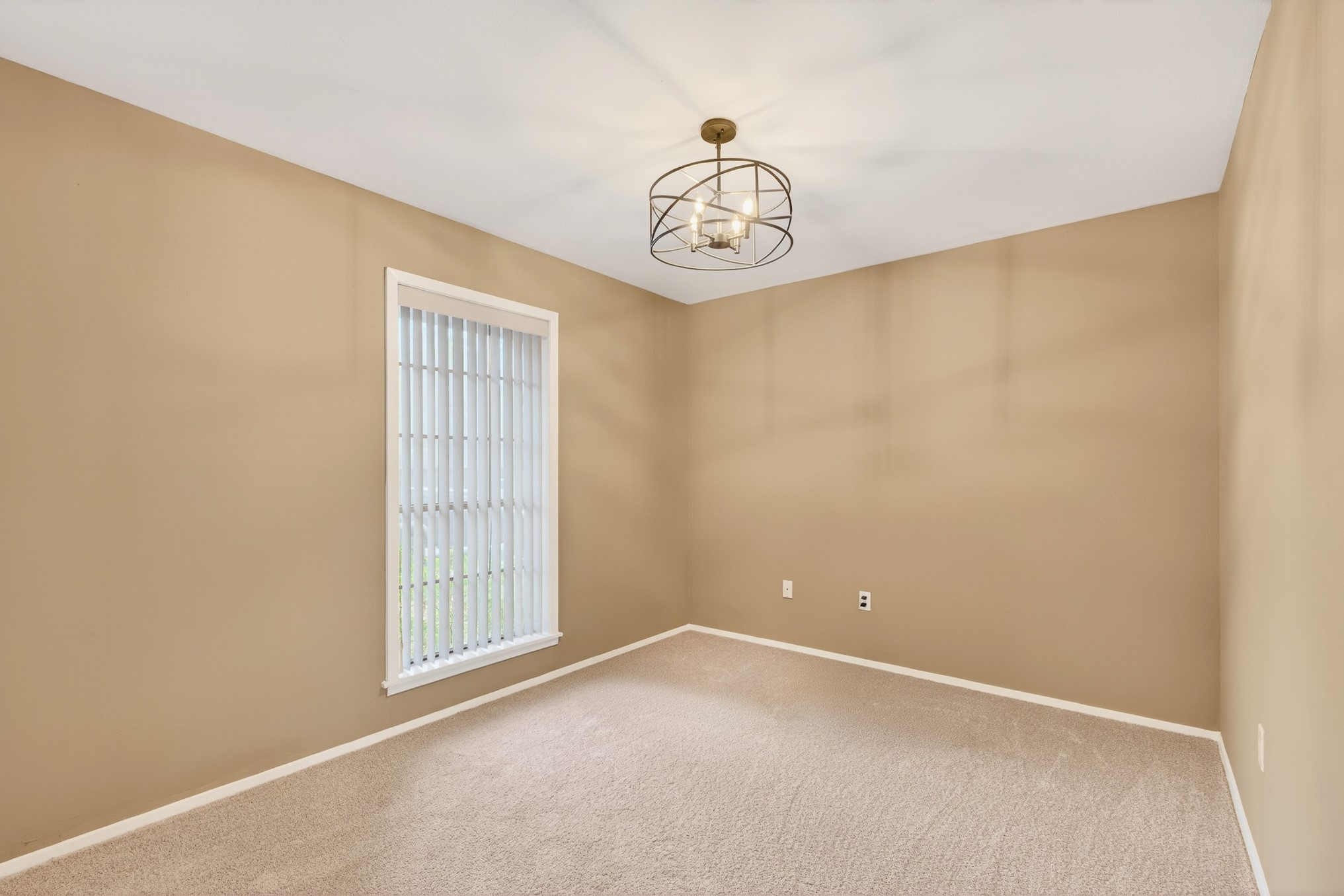 304 Fullen Street Conroe, TX 77301 - Photo 11 of 25 The formal dining room or potential study with a front-facing window