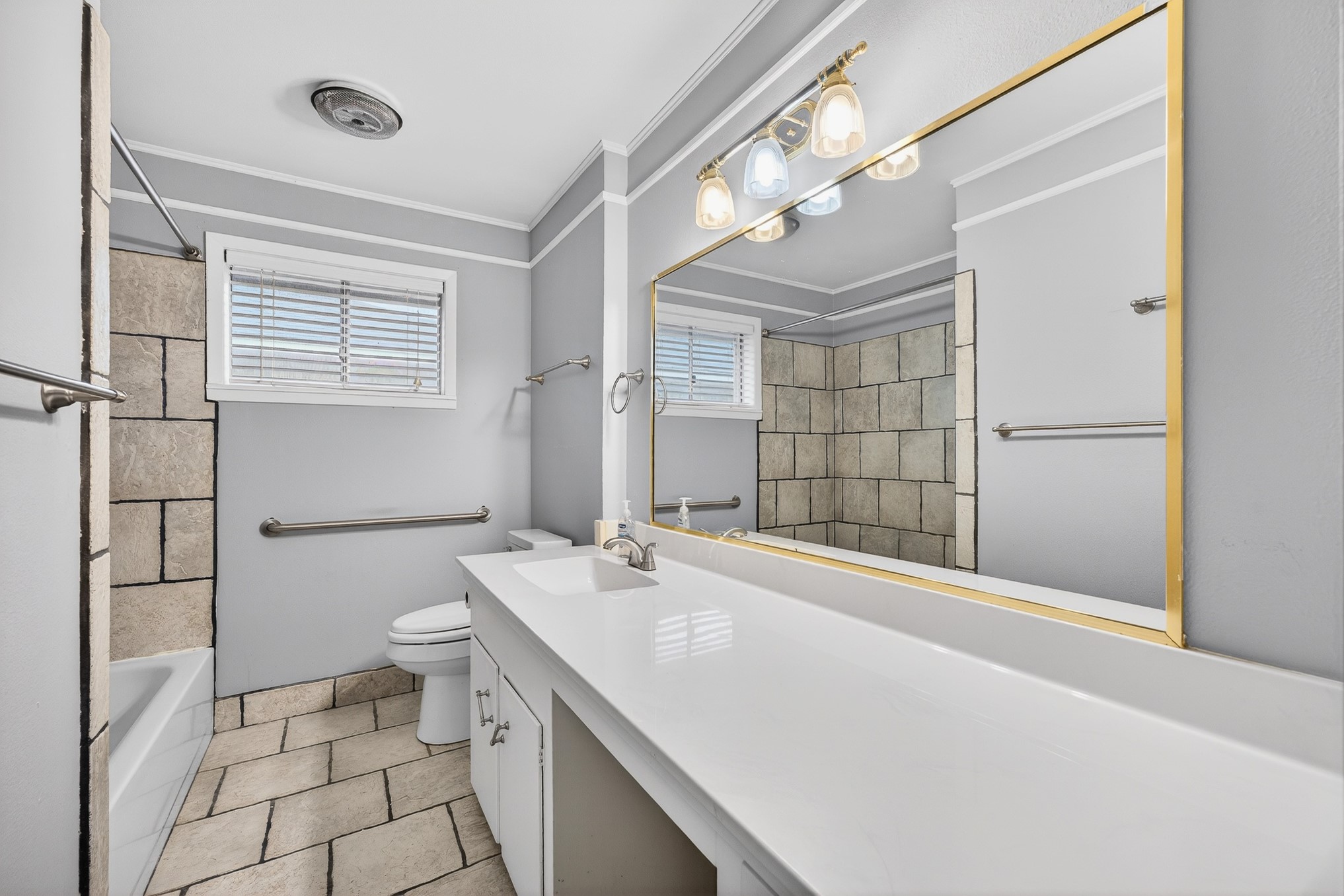 304 Fullen Street Conroe, TX 77301 - Photo 20 of 25 The second bath features a vanity knee space or make-up area.